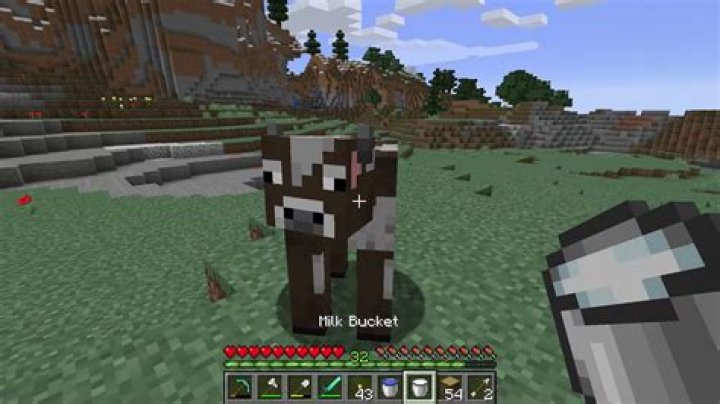 How do you milk a cow in minecraft